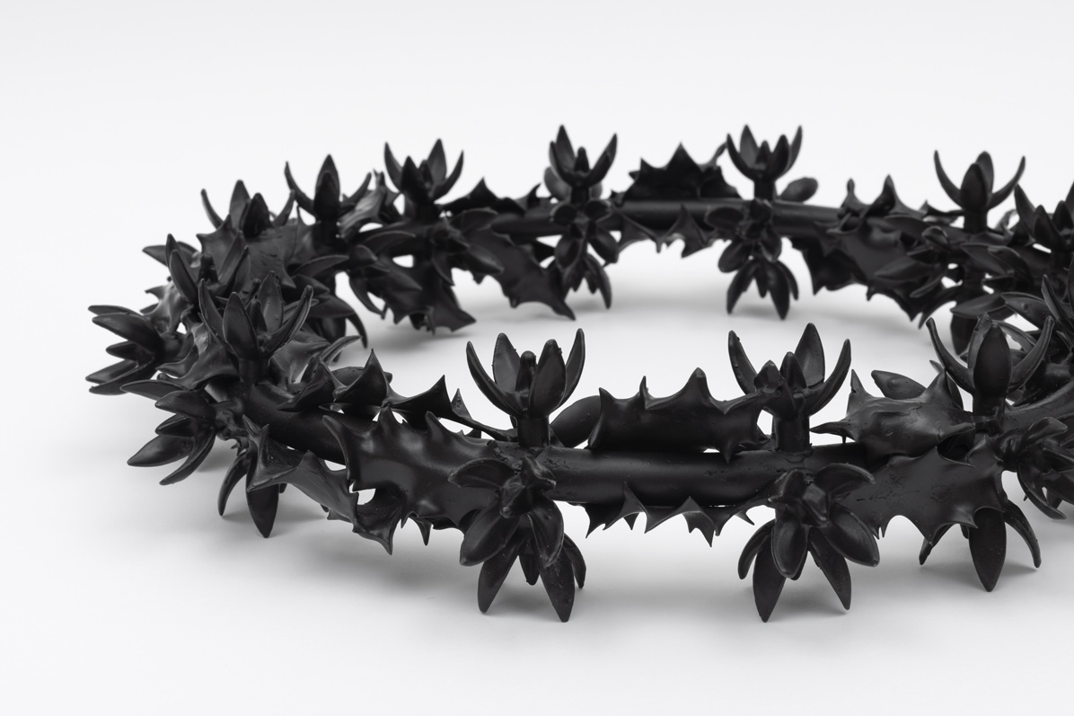 A spiked crown made of dark bronze