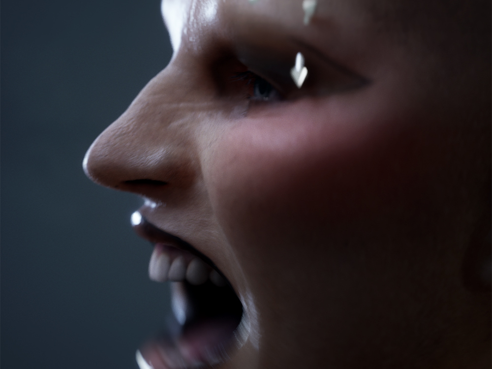 The side of a CGI face screaming in the dark