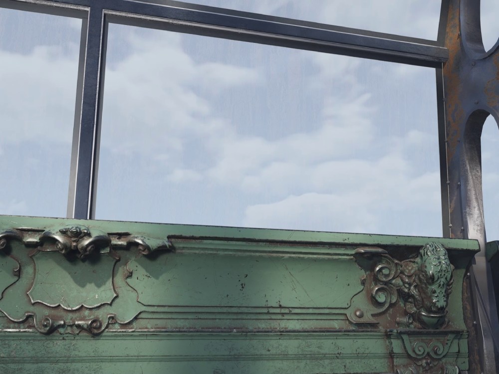 A cloudy blue grey sky framed by metal and a green wall